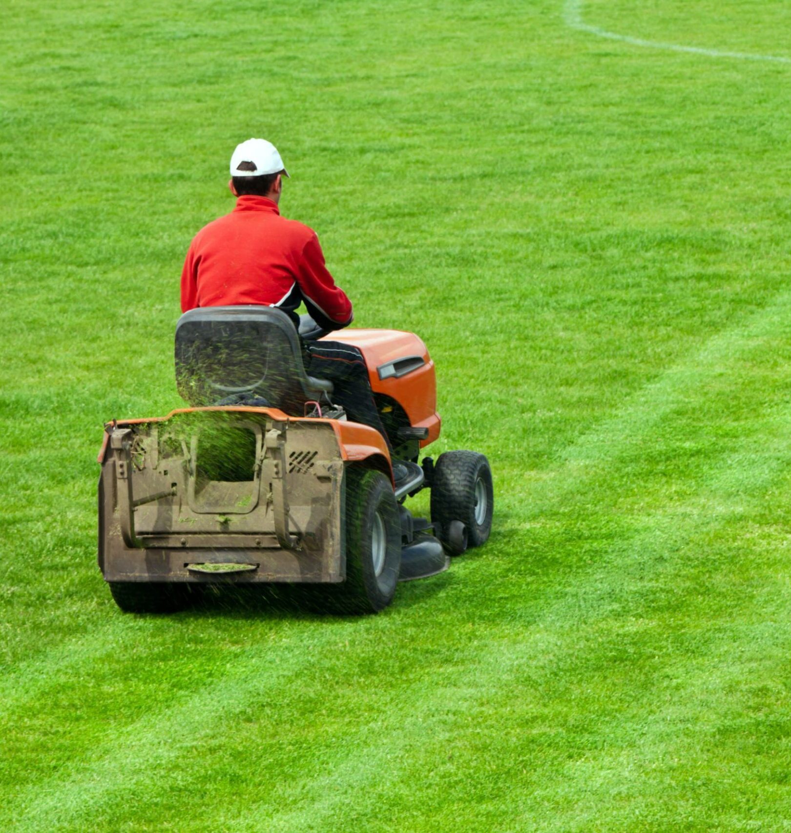Mowing grass in stadium