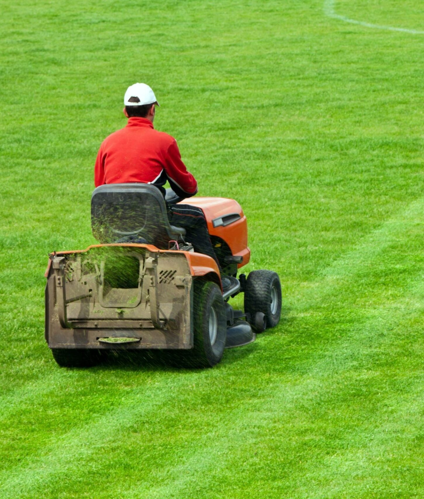 Mowing grass in stadium